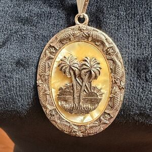 Palm Medallion Vintage pendant made in Germany 24” chain .